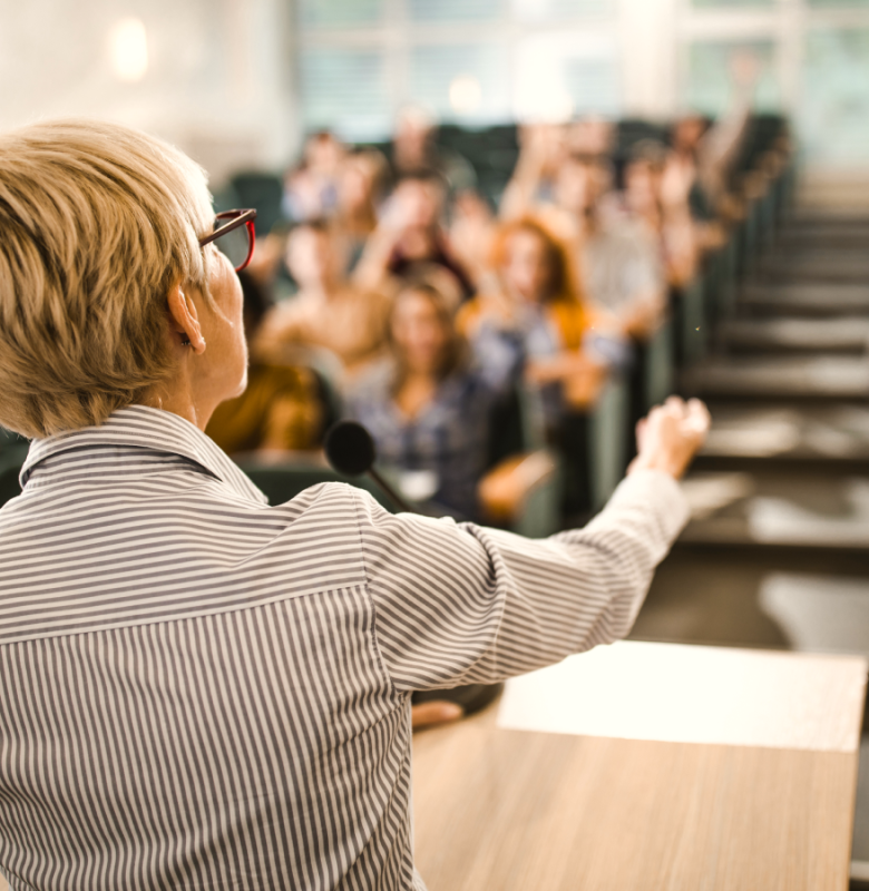 Women giving a lecture in an university