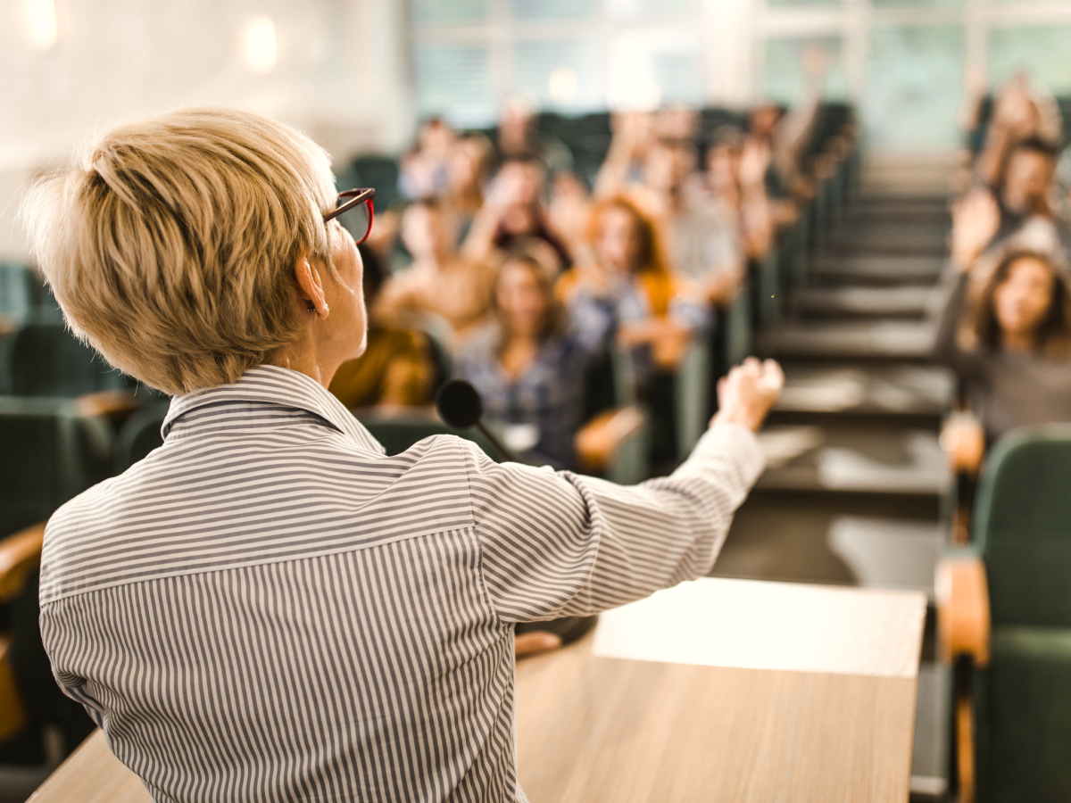 Women giving a lecture in an university